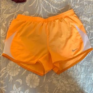Nike orange running shorts